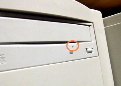 how to open stuck CD DVD drive